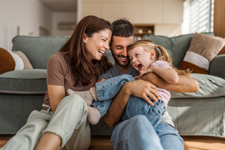 happy family playing in the living room